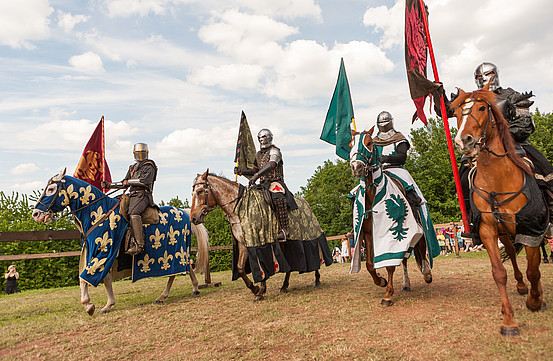Four medieval knights on horseback