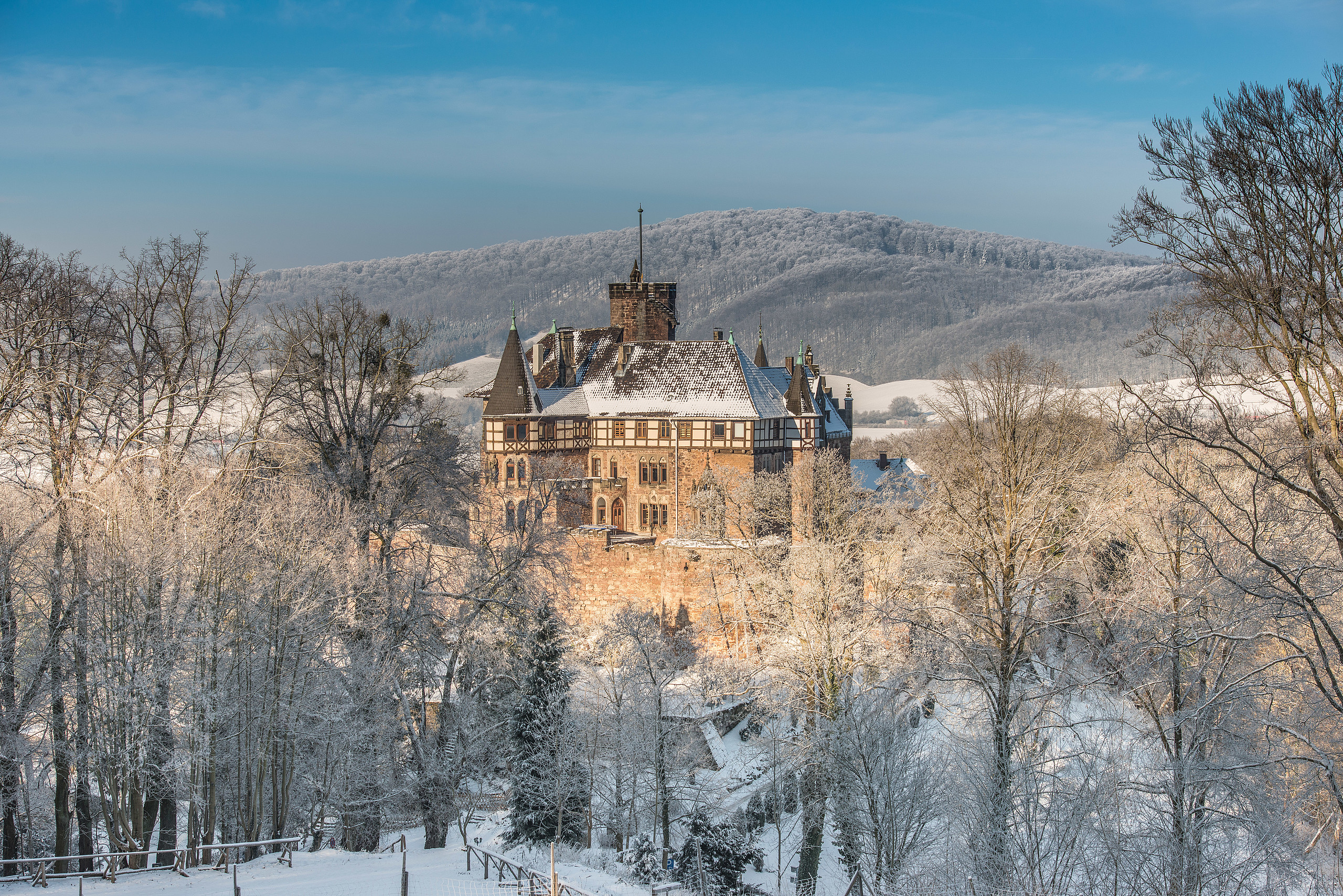 Schloss Berlepsch from a distance dusted with snow